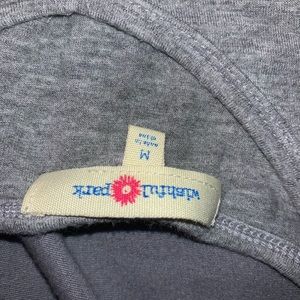 Cute grey top with skull design pocket